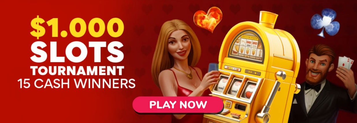 $1,000 Slots Tournament promotion banner with a woman in a red dress holding a drink, a man in a tuxedo holding cards, and a yellow slot machine. Text reads: '$1,000 Slots Tournament – 15 Cash Winners.' A pink button says 'Play Now.