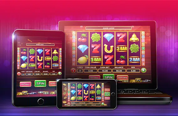 Slots of Vegas casino website banner displayed on three devices - desktop, mobile and tablet
